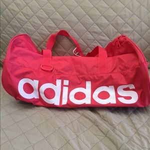 Coral colored adidas duffel bag